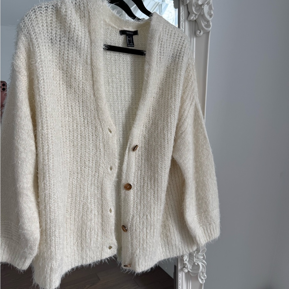 Off white sweater in size L